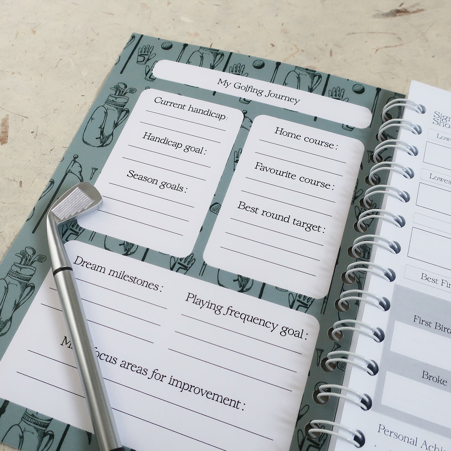 Golf Log Book Seasonal Goals on a textured background