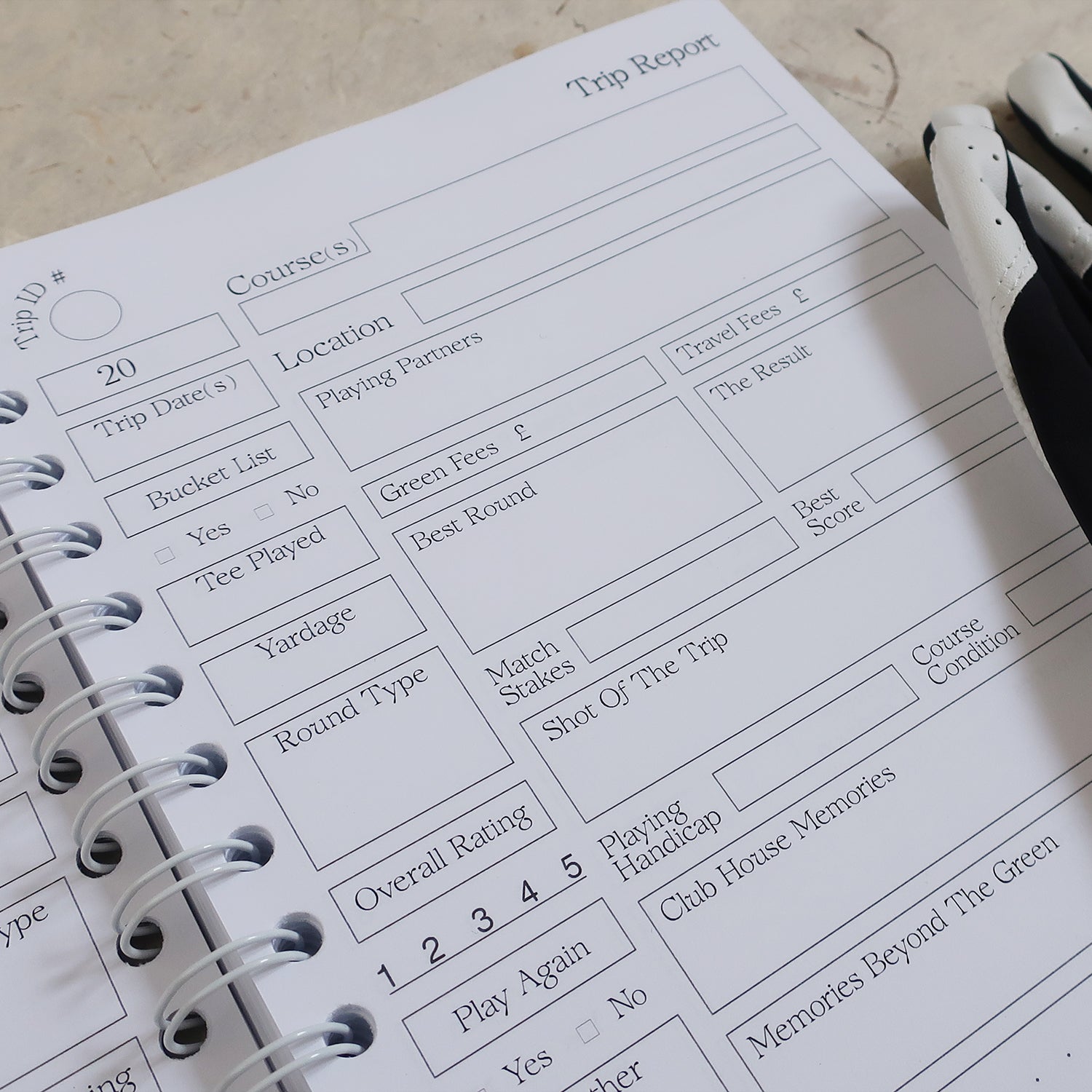 Golf Log Book Open On A Trip Report Page With A Golf Glove Laid Across The Corner Of The Book