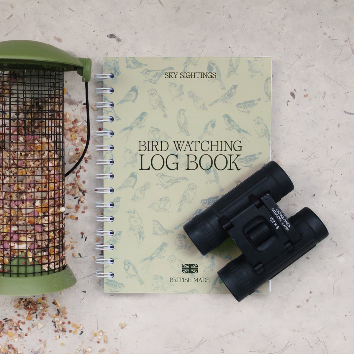 wayzgoose Bird Watching Log Book With Binoculars & Bird Feeder On A Textured Background